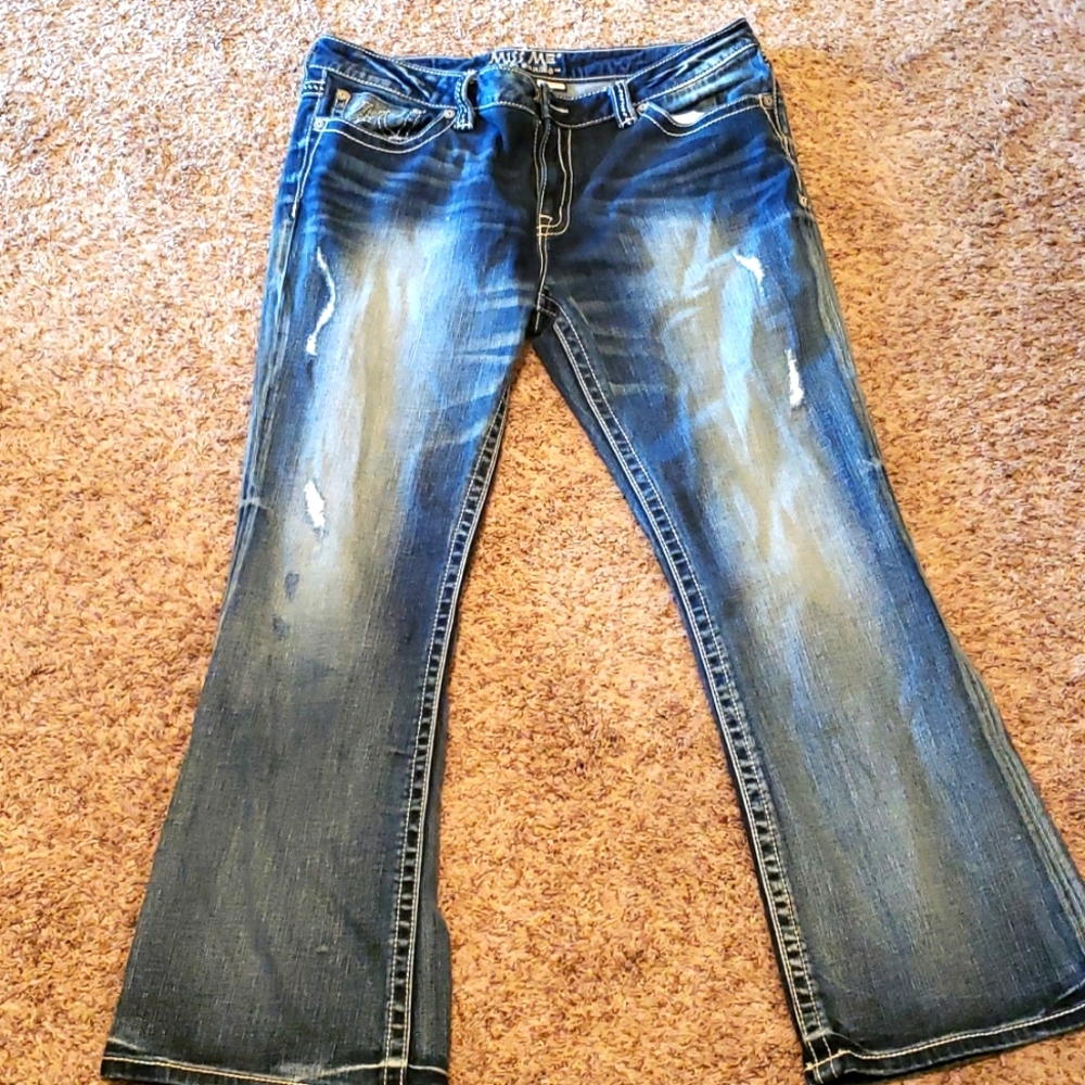 Never Worn Miss Me Jeans Size 34 Length 31. Easy boot.